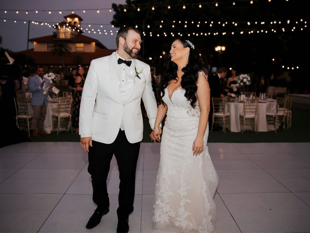 Miami wedding couple enters their dance floor for the first dance
