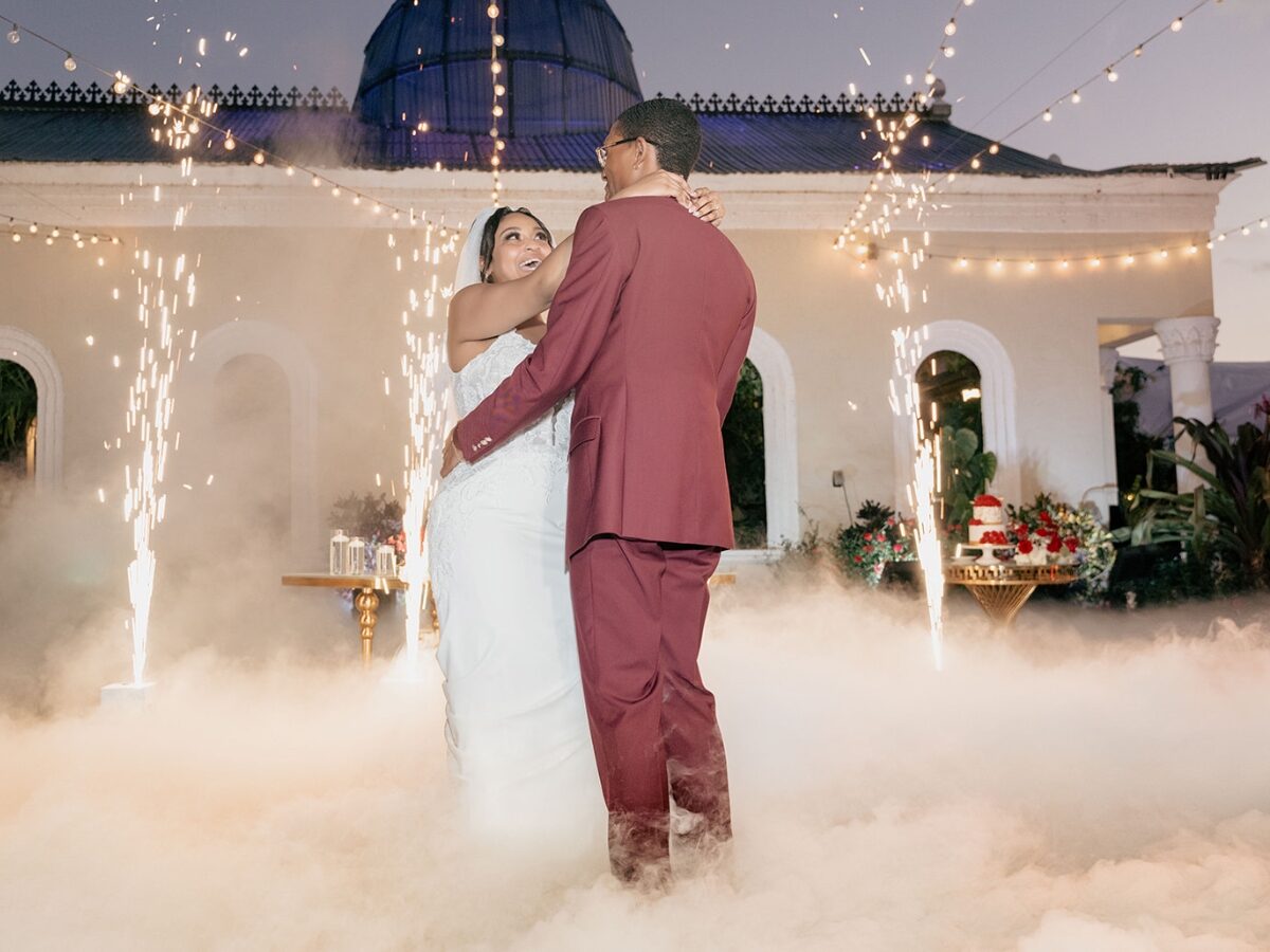 Couple sharing their first dance on the clouds at their Miami wedding