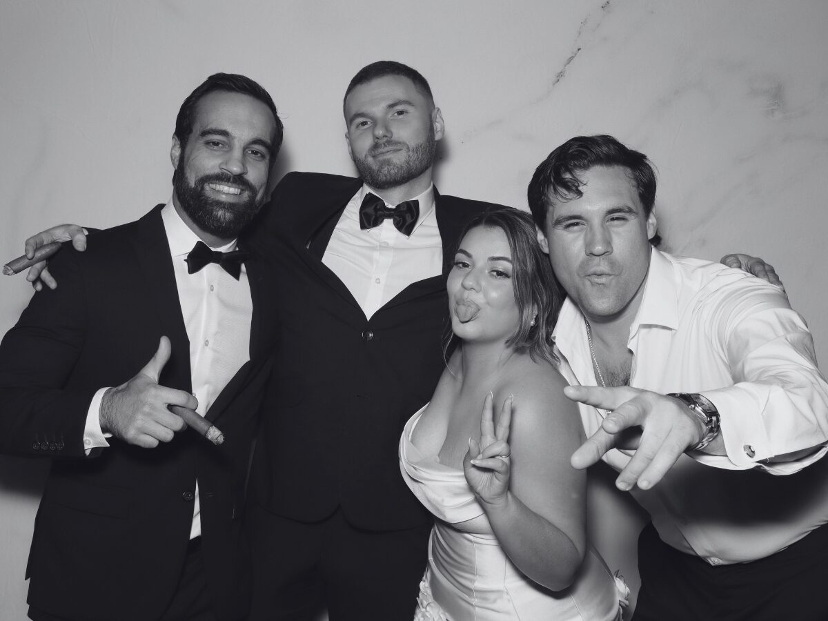 Stylish black-and-white wedding photo booth portrait