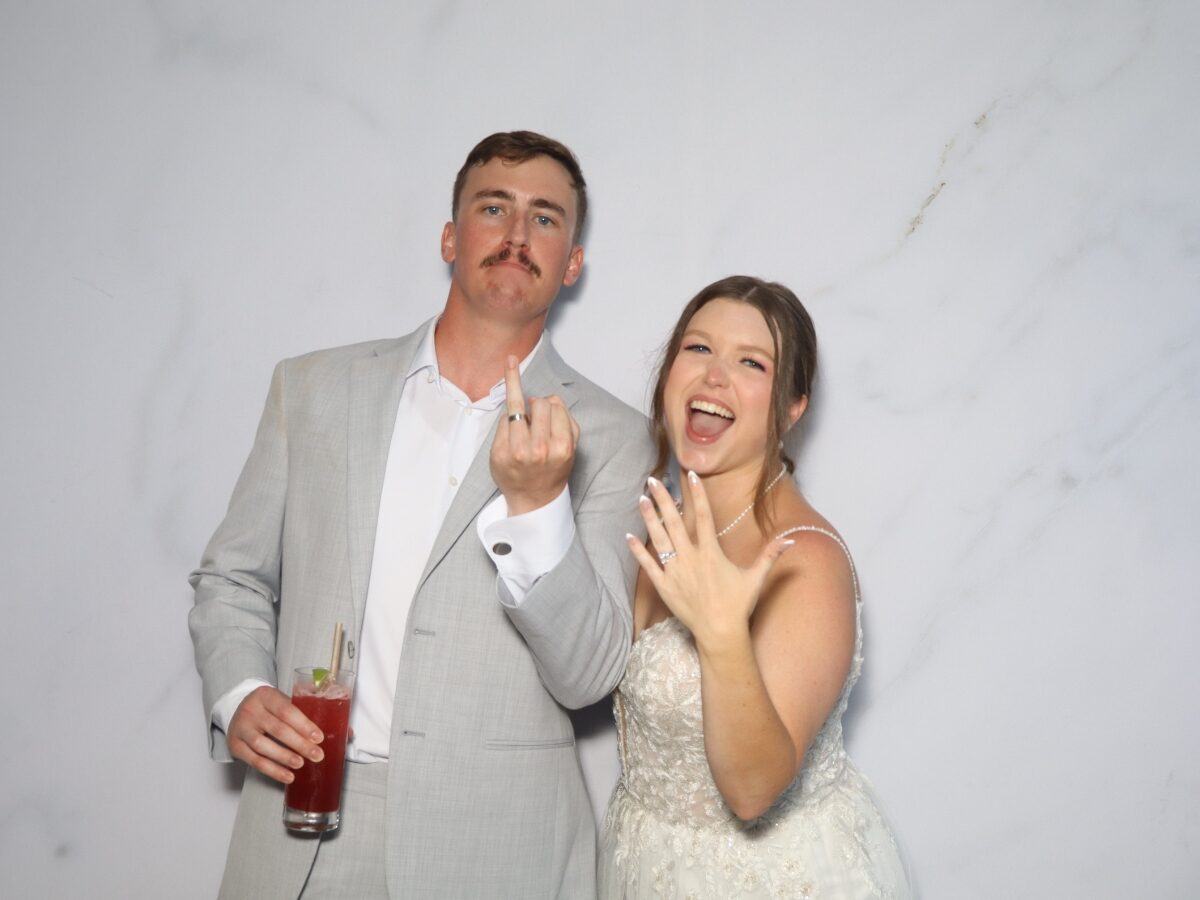 Friends celebrating in the South Florida wedding photo booth